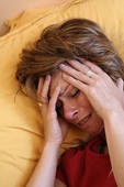 female with migraine - Migraine is triggered by years of unexpressed emotional pain